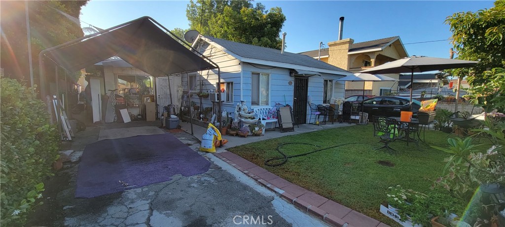 4014 Cedar Avenue El Monte, CA 91731 - Photo 3 of 5 a front view of a house with garden