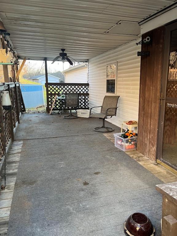 266 Tollgate Run Waynesburg, PA 15370 - Photo 11 of 20 a view of a patio with table and chairs