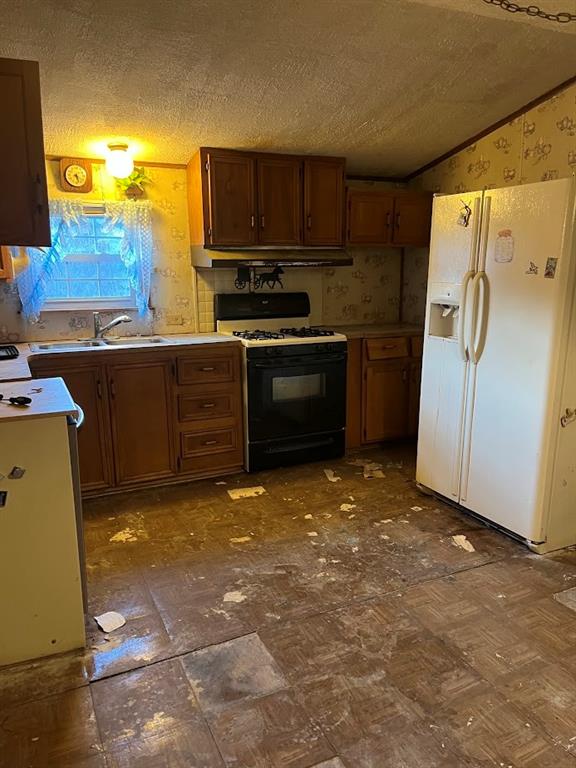 266 Tollgate Run Waynesburg, PA 15370 - Photo 20 of 20 a kitchen with stainless steel appliances granite countertop a stove a sink and a refrigerator