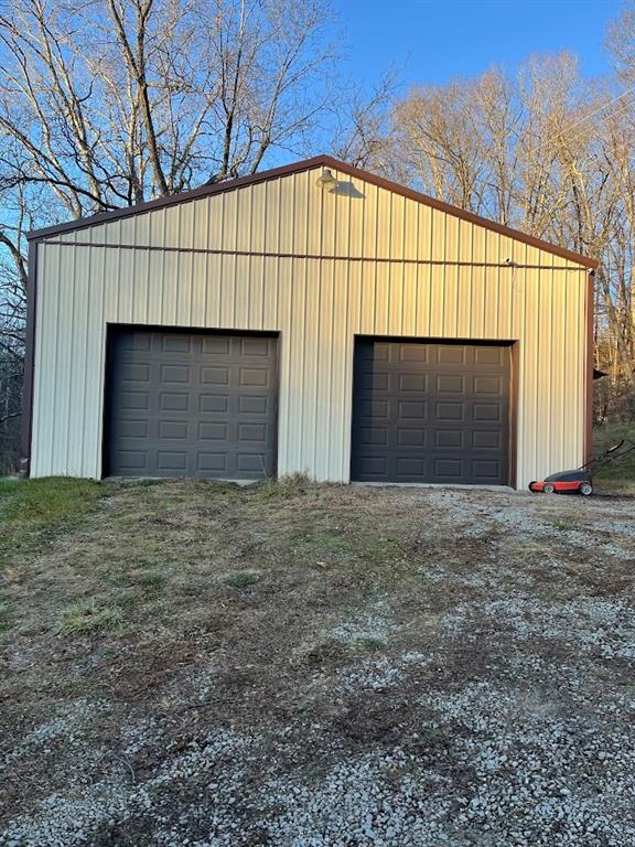 266 Tollgate Run Waynesburg, PA 15370 - Photo 5 of 20 a view of large house with a garage