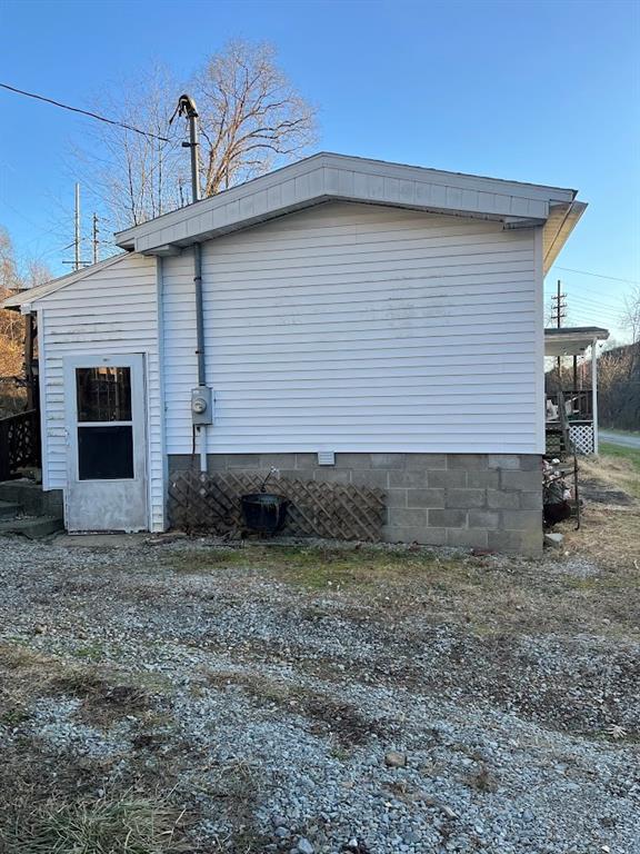 266 Tollgate Run Waynesburg, PA 15370 - Photo 7 of 20 a house view with a backyard space