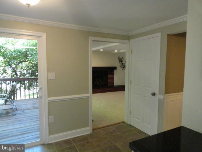 2343 Old Trail Drive Reston, VA 20191 - Photo 1 of 24 Kitchen and family room open onto deck