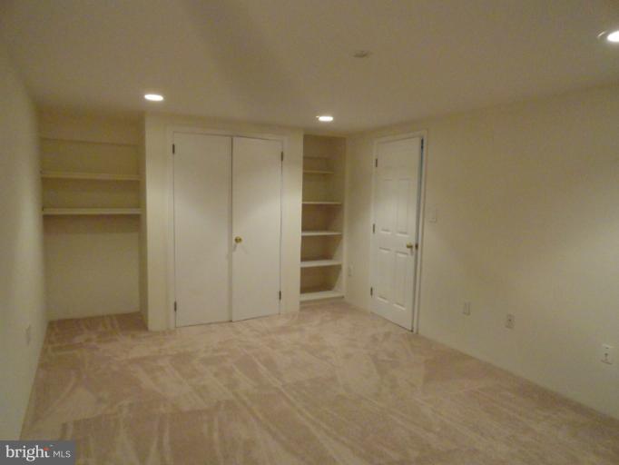 2343 Old Trail Drive Reston, VA 20191 - Photo 3 of 24 Lower level den with built in shelves