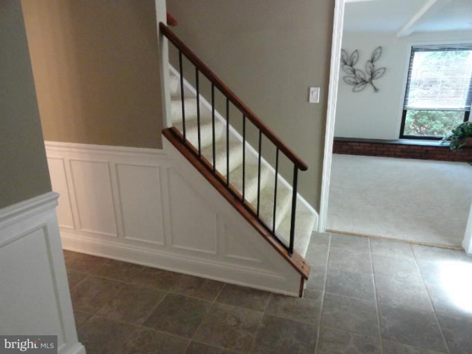2343 Old Trail Drive Reston, VA 20191 - Photo 22 of 24 Front entry foyer with wainscoting detail