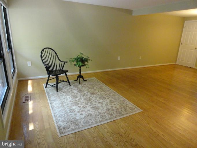 2343 Old Trail Drive Reston, VA 20191 - Photo 4 of 24 Living Room with hardwood floors