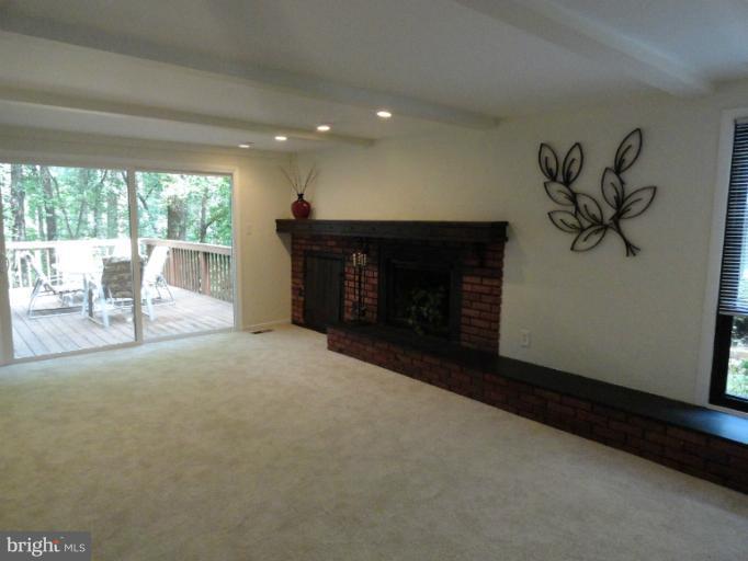 2343 Old Trail Drive Reston, VA 20191 - Photo 9 of 24 Family room opens out onto the deck