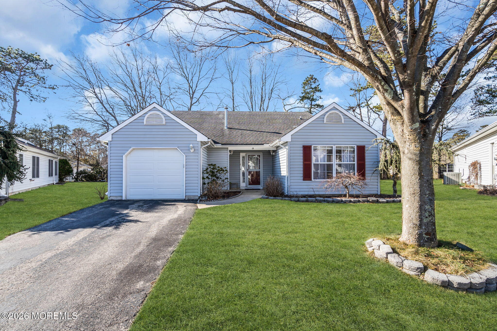 13 Golden Rod Court Brick, NJ 08724 - Photo 2 of 39 a front view of a house with a yard