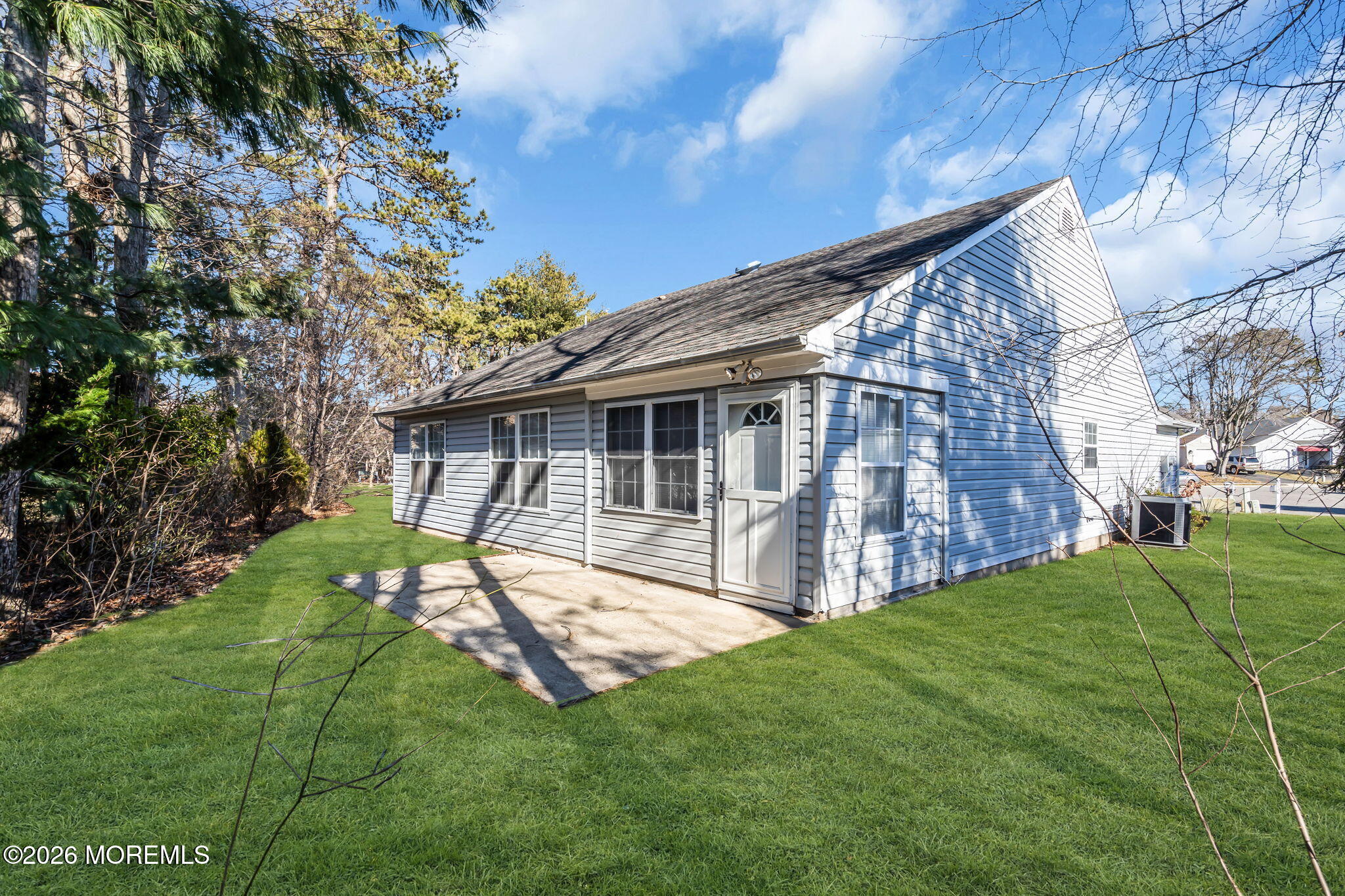 13 Golden Rod Court Brick, NJ 08724 - Photo 26 of 39 a view of backyard with table and chairs and potted plants