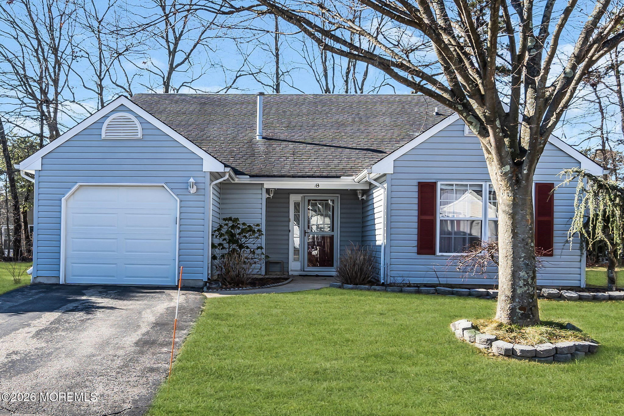 13 Golden Rod Court Brick, NJ 08724 - Photo 5 of 39 a front view of a house with a garden