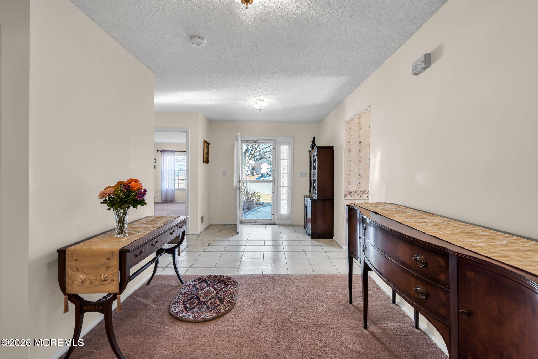 13 Golden Rod Court Brick, NJ 08724 - Photo 7 of 39 a living room with furniture and a table
