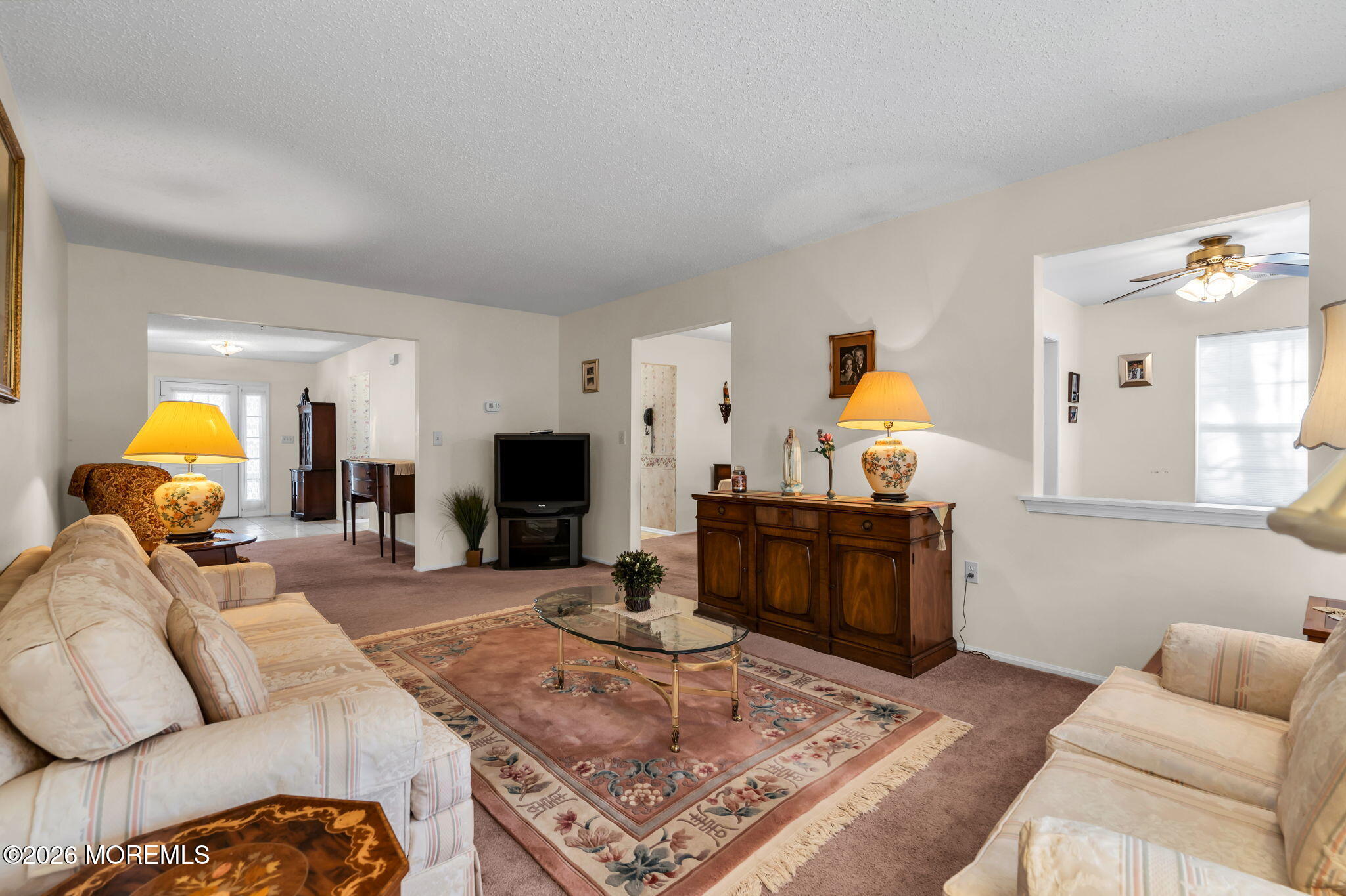 13 Golden Rod Court Brick, NJ 08724 - Photo 8 of 39 a living room with furniture and a fireplace