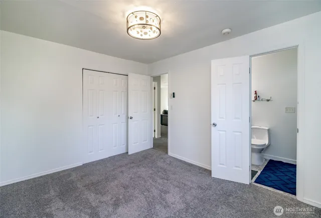 a view of a bathroom with a toilet