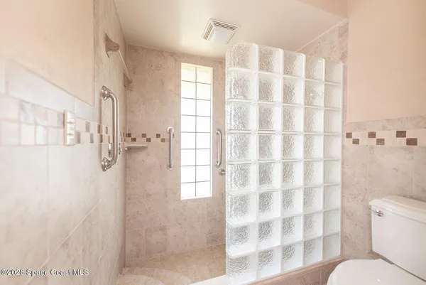 a bathroom with a shower curtain