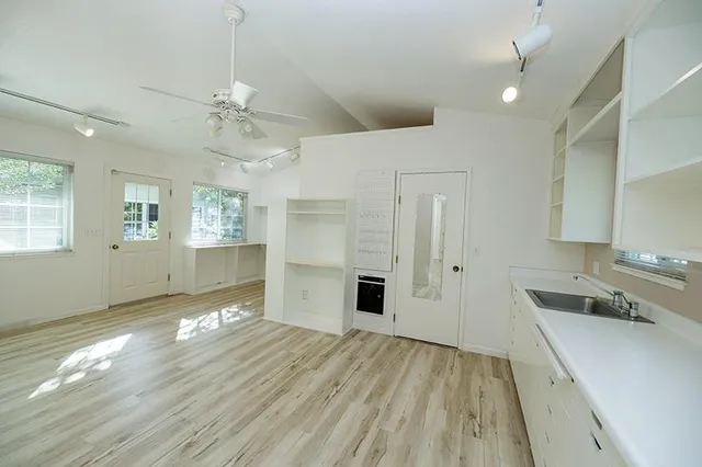 a view of an empty room and window