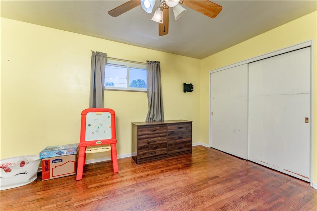 717 Morgantown Road Uniontown, PA 15401 - Photo 20 of 23 a bedroom with a bed and a dresser