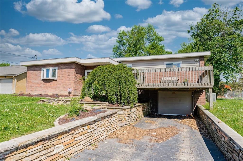 717 Morgantown Road Uniontown, PA 15401 - Photo 2 of 23 a view of a house with a yard