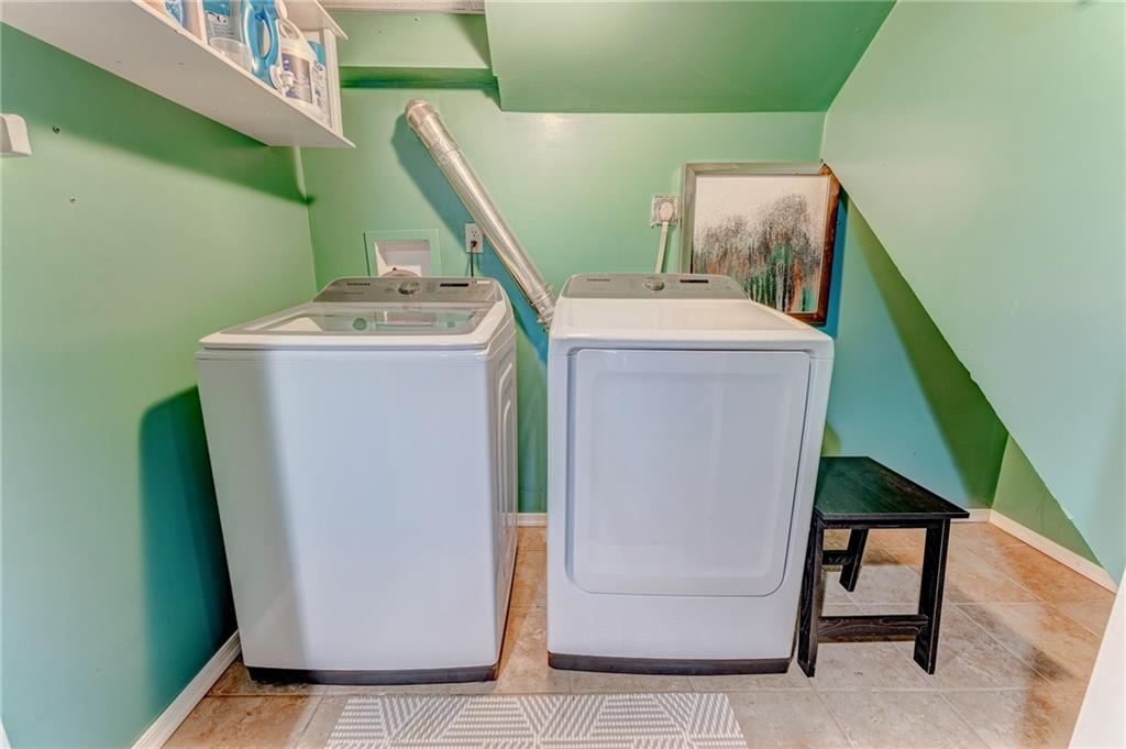 717 Morgantown Road Uniontown, PA 15401 - Photo 23 of 23 a utility room with dryer and washer