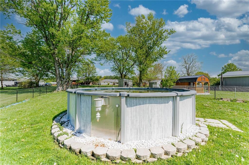 717 Morgantown Road Uniontown, PA 15401 - Photo 4 of 23 a view of a garden with a fountain