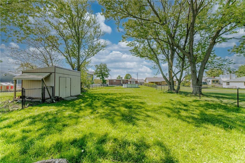 717 Morgantown Road Uniontown, PA 15401 - Photo 7 of 23 a view of an house with backyard space and garden