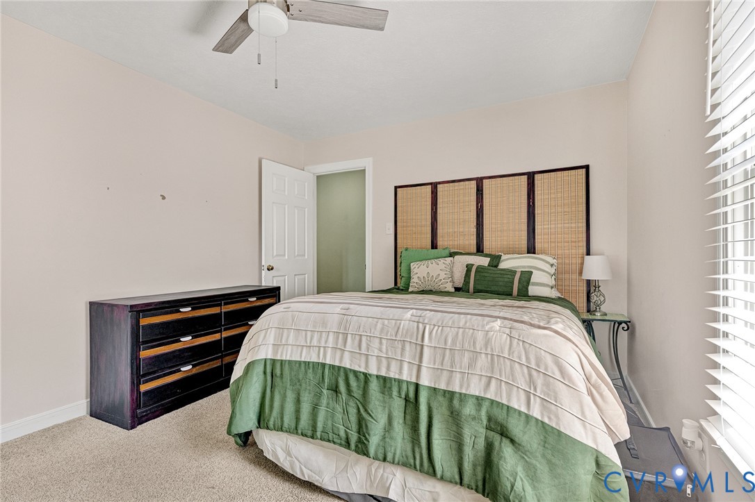 3841 Strawhill Road Richmond, VA 23231 - Photo 32 of 56 Wall-to-wall carpeting and a ceiling fan with ligh