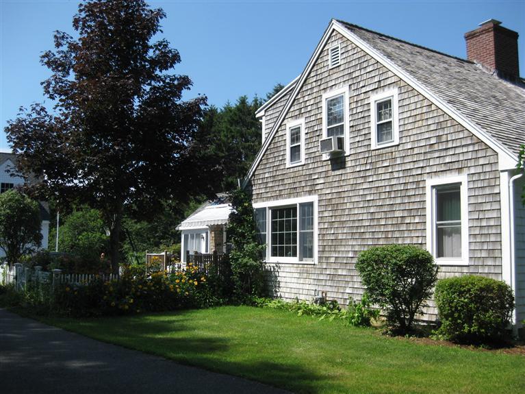 150 Shore Road Bourne, MA 02532 - Photo 3 of 28 a view of a house with a yard