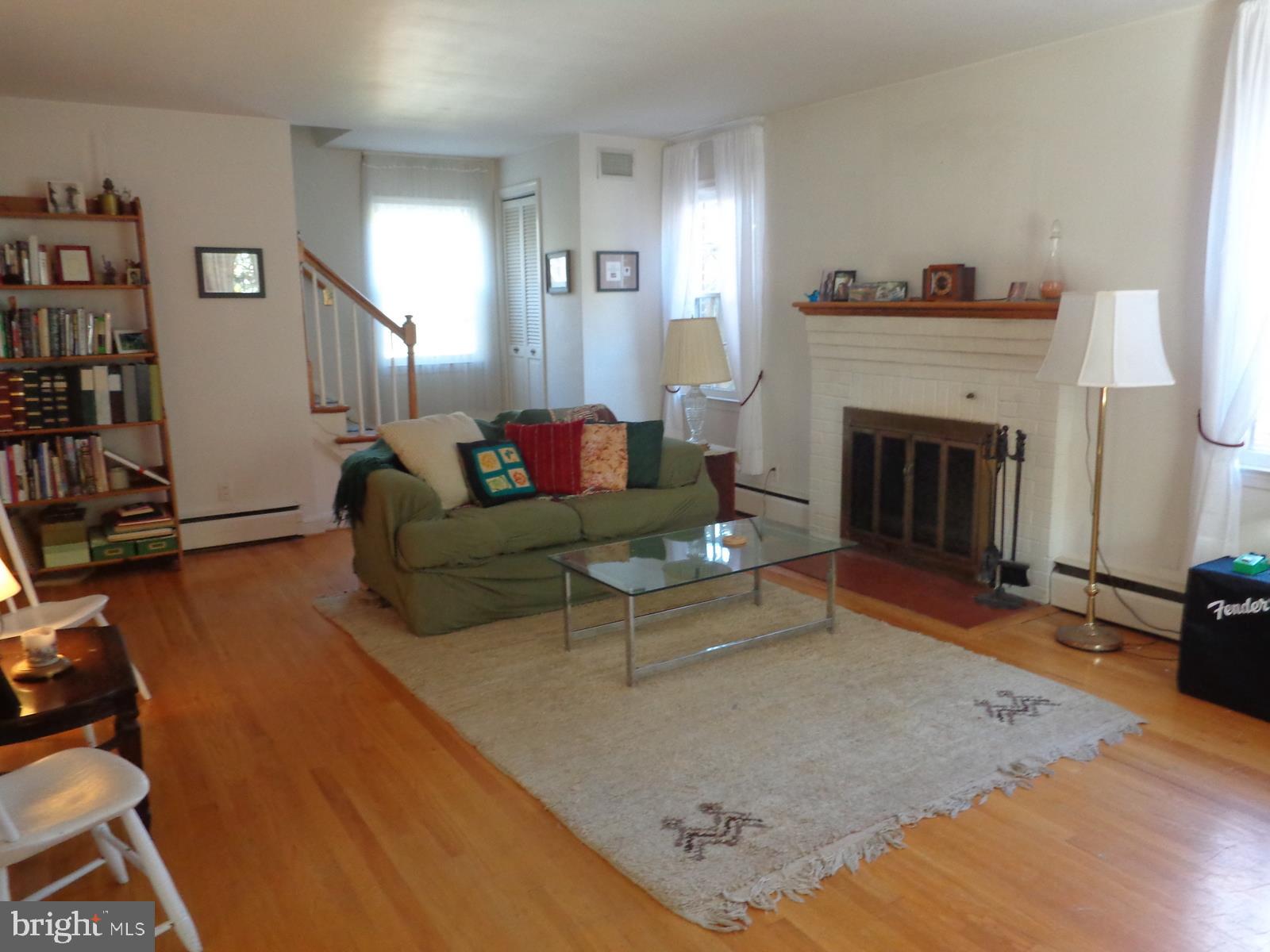 518 Holden Road Baltimore, MD 21286 - Photo 2 of 17 Living room with wood burning fireplace