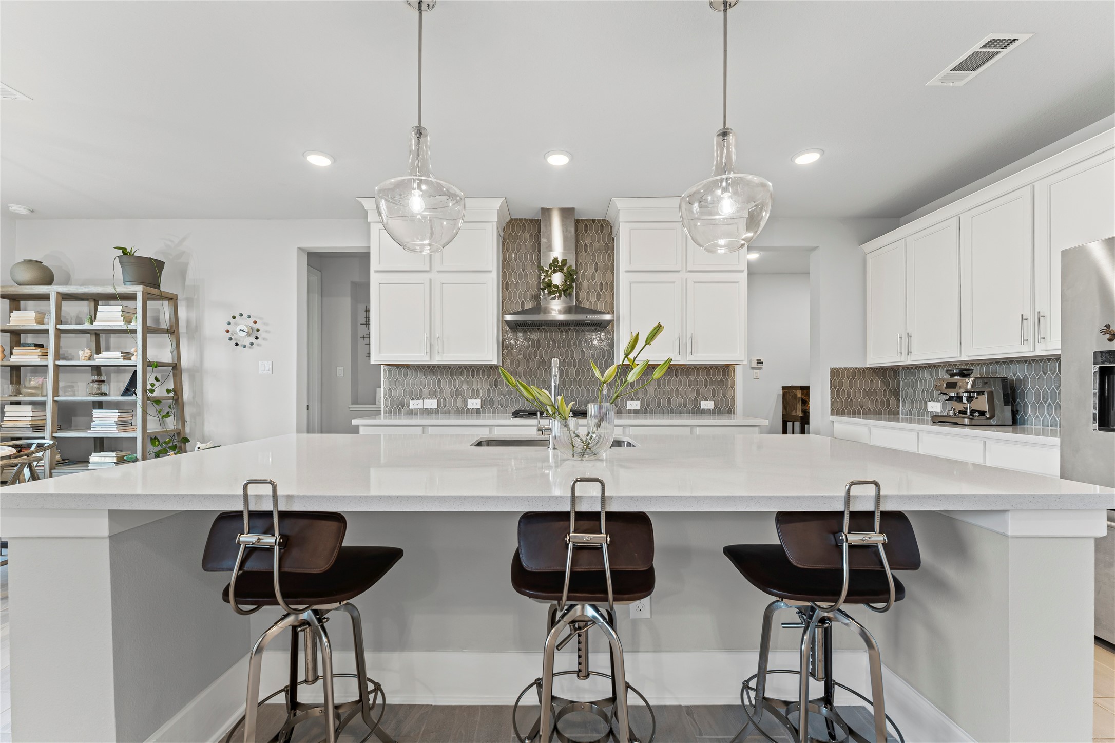8815 Iron Forge Road Missouri City, TX 77459 - Photo 11 of 40 a kitchen with counter top space cabinets and appliances