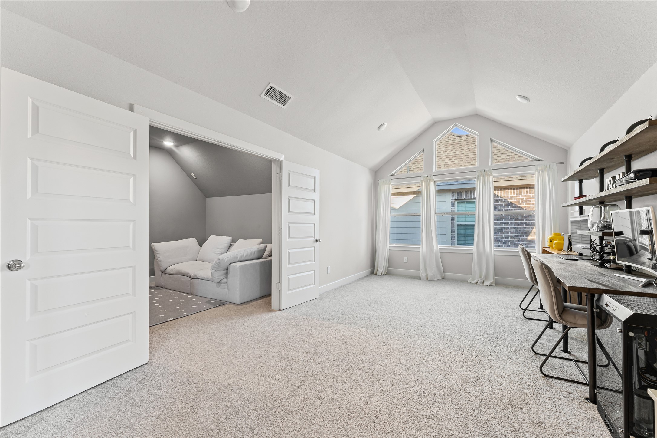 8815 Iron Forge Road Missouri City, TX 77459 - Photo 27 of 40 a view of a livingroom with furniture and a window