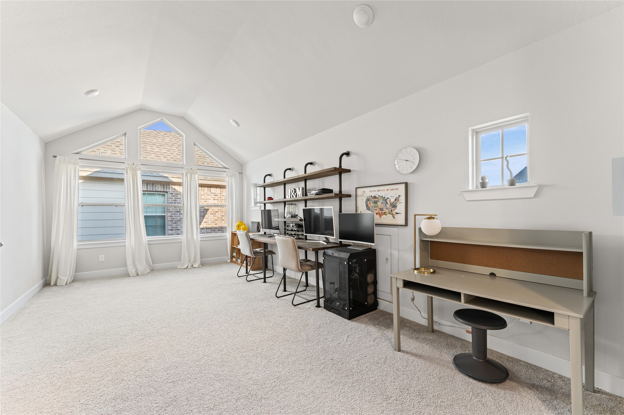 8815 Iron Forge Road Missouri City, TX 77459 - Photo 28 of 40 a view of a livingroom with furniture and a window