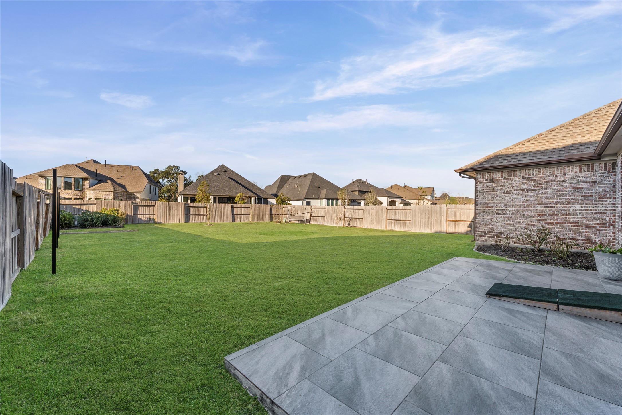 8815 Iron Forge Road Missouri City, TX 77459 - Photo 40 of 40 a view of a green field with house in the background