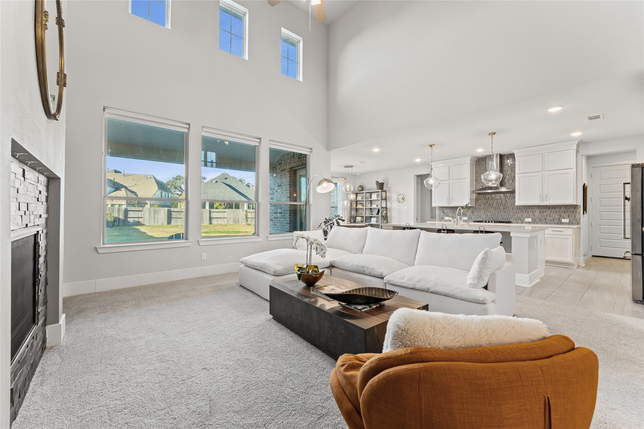 8815 Iron Forge Road Missouri City, TX 77459 - Photo 8 of 40 a living room with furniture and a large window