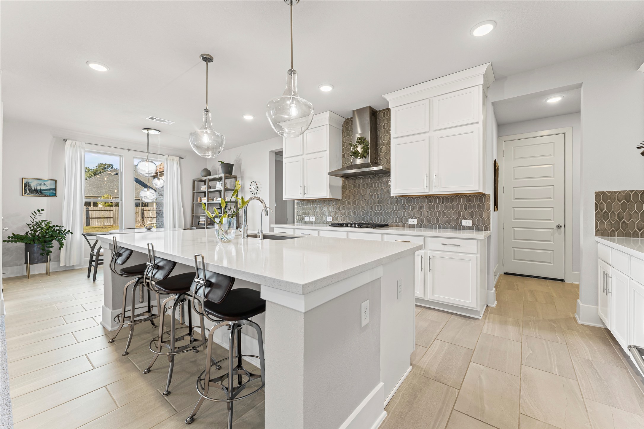 8815 Iron Forge Road Missouri City, TX 77459 - Photo 9 of 40 a large kitchen with lots of counter space and appliances