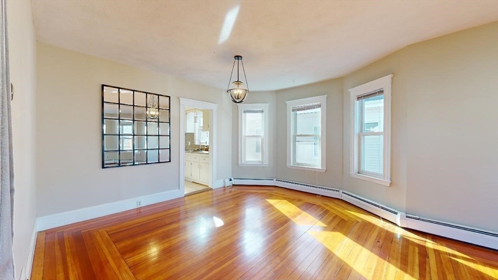17 Gorham Road, Unit 2 Medford, MA 02155 - Photo 11 of 37 a view of an empty room with a window