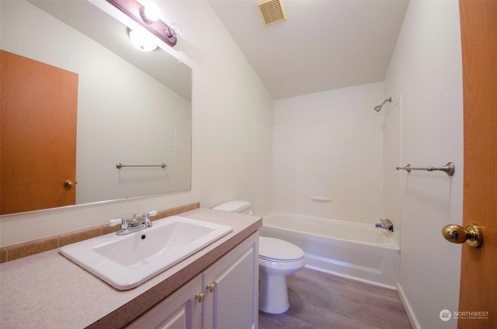 8827 173rd Avenue Southwest Rochester, WA 98579 - Photo 12 of 15 a bathroom with a sink toilet and shower