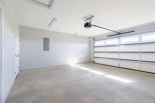 a view of an empty room with a windows