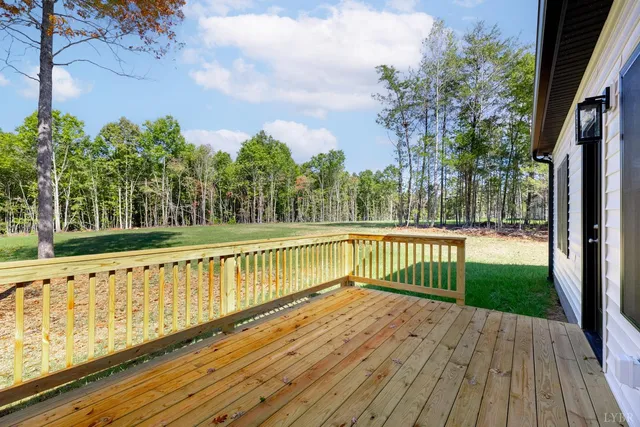 a view of outdoor space with wooden deck
