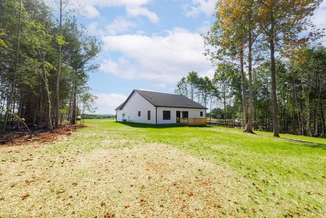 a house with trees in front of it