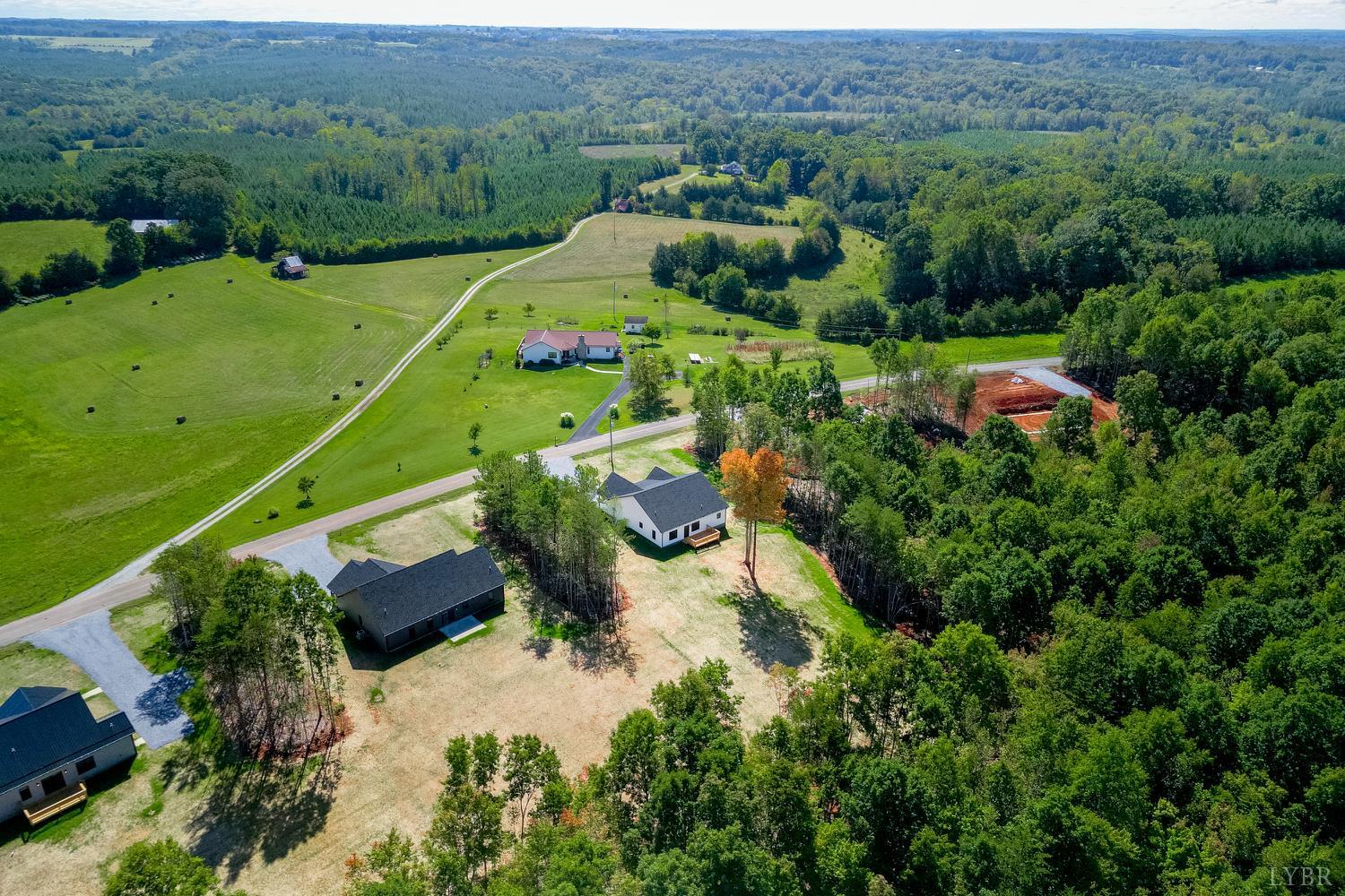 757 Down Creek Road Brookneal, VA 24528 - Photo 48 of 49 an aerial view of a golf course with houses