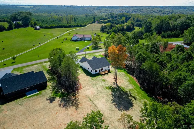 an aerial view of a house with a garden