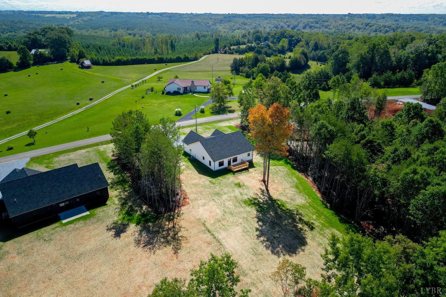 757 Down Creek Road Brookneal, VA 24528 - Photo 49 of 49 an aerial view of a house with a garden