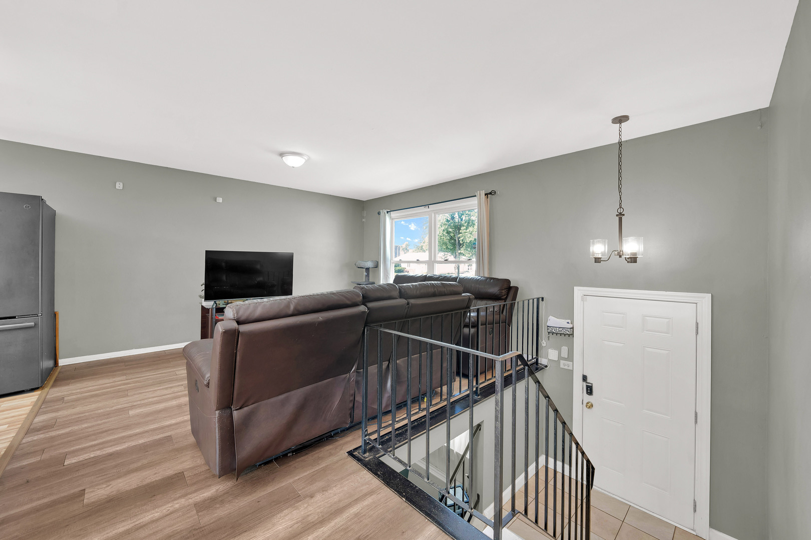 17303 Apple Tree Drive Hazel Crest, IL 60429 - Photo 15 of 23 a view of a livingroom with furniture and flat screen tv