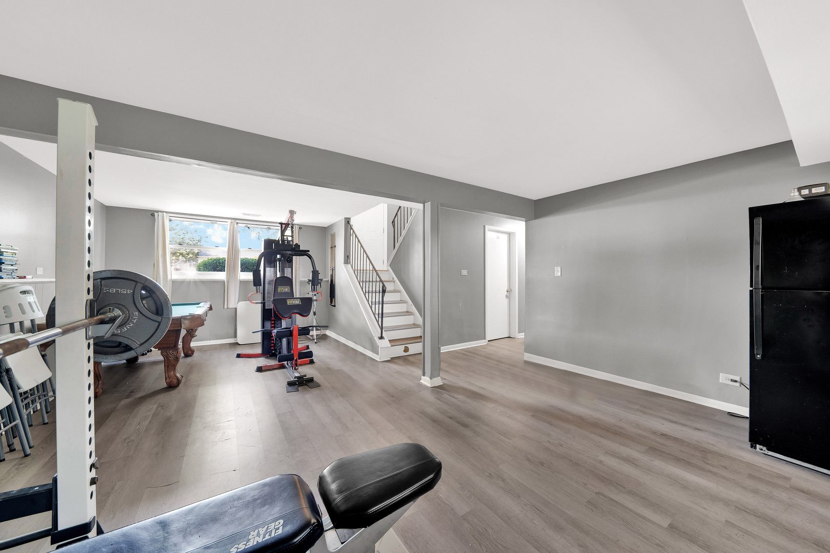 17303 Apple Tree Drive Hazel Crest, IL 60429 - Photo 17 of 23 a view of a room with gym equipment