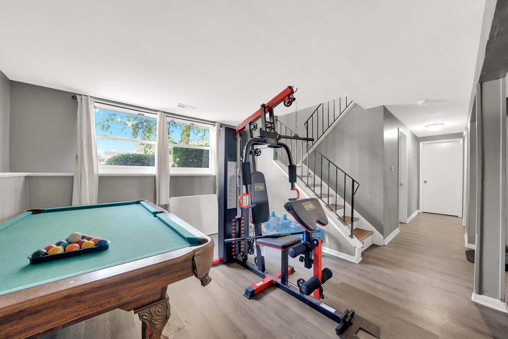 17303 Apple Tree Drive Hazel Crest, IL 60429 - Photo 18 of 23 a view of a room with gym equipment