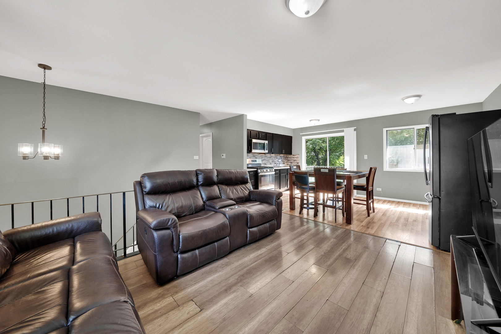 17303 Apple Tree Drive Hazel Crest, IL 60429 - Photo 7 of 23 a living room with furniture and a table