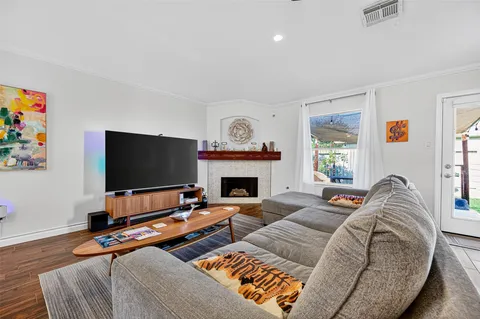 a room with furniture and a flat screen tv