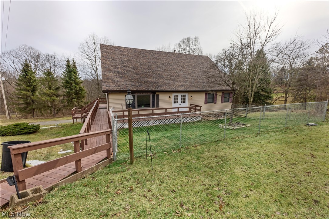 140 Iris Lane Colliers, WV 26035 - Photo 2 of 47 View of yard featuring a deck