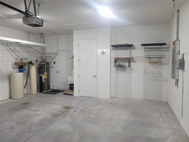 a view of empty room with ceiling fan