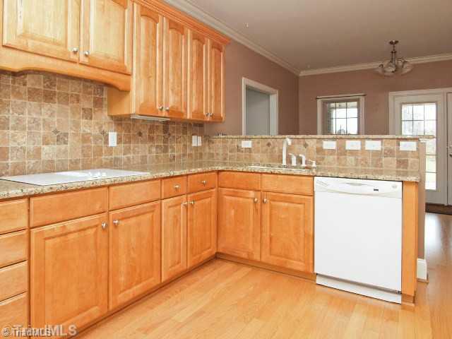 8450 Alice Player Drive Oak Ridge, NC 27310 - Photo 4 of 16 Kitchen.