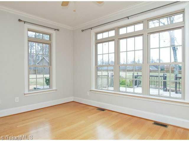8450 Alice Player Drive Oak Ridge, NC 27310 - Photo 8 of 16 Sunroom.