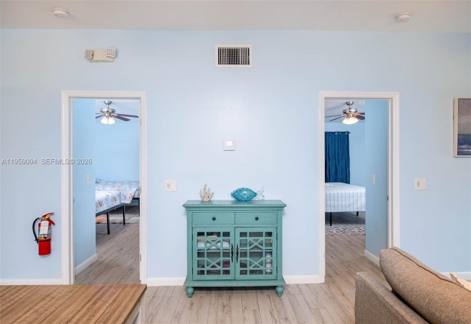 410 10th Street Key Colony Beach, FL 33051 - Photo 19 of 62 a view of livingroom with furniture and wooden floor